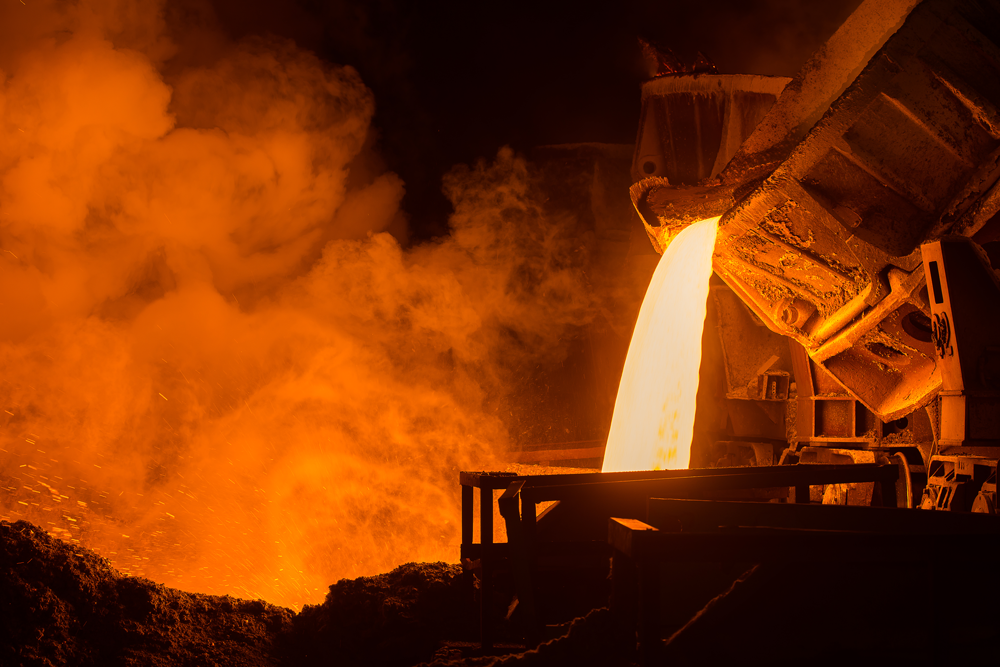 Modern steel rolling mill with glowing steel production